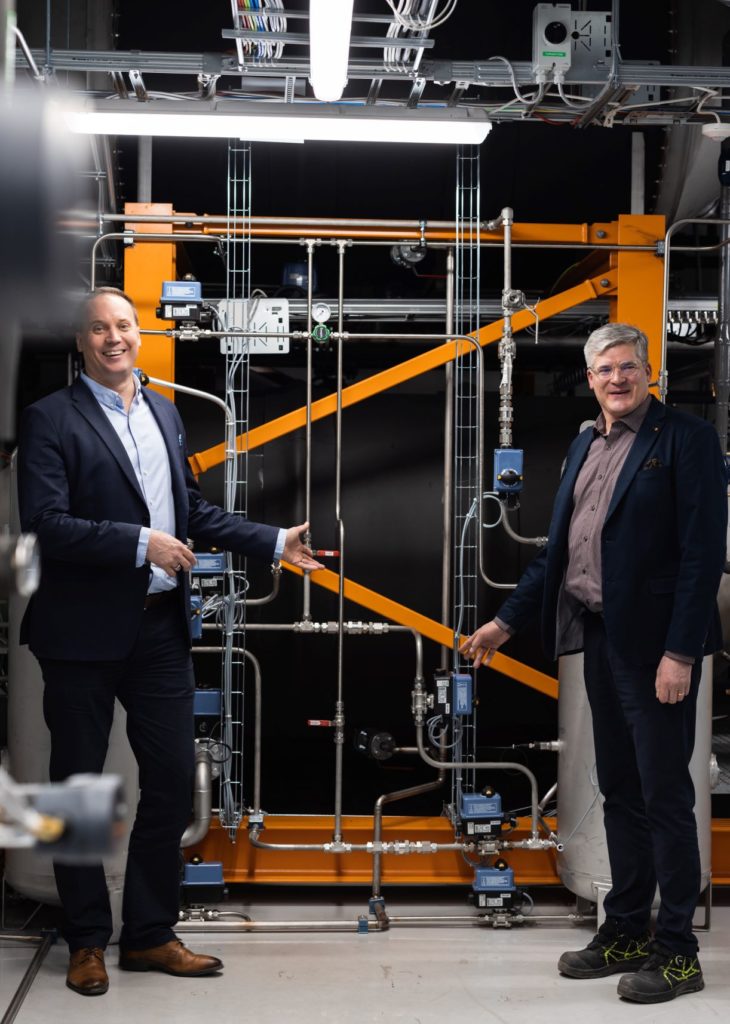 Wärtsilä’s Sustainable Innovation Director Hannu Mäntymaa and Facility & Energy Manager Jukka Rapo with Soletair Power’s HVAC Integrated CO2 Capture Unit installed at Sustainable Technology Hub, Vaasa, Finland